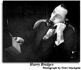 Photograph of Harry Bridge on the telephone, taken by Peter Stackpole.